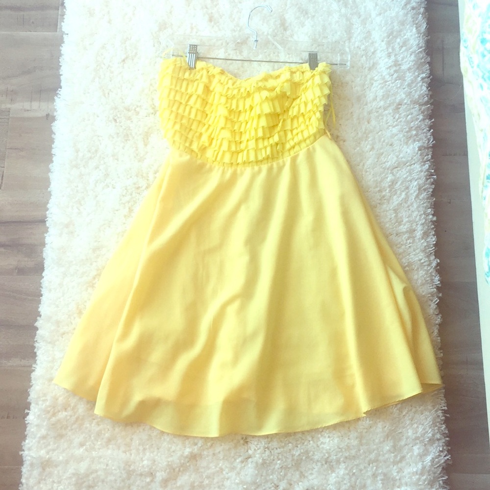 Strapless yellow ruffle dress